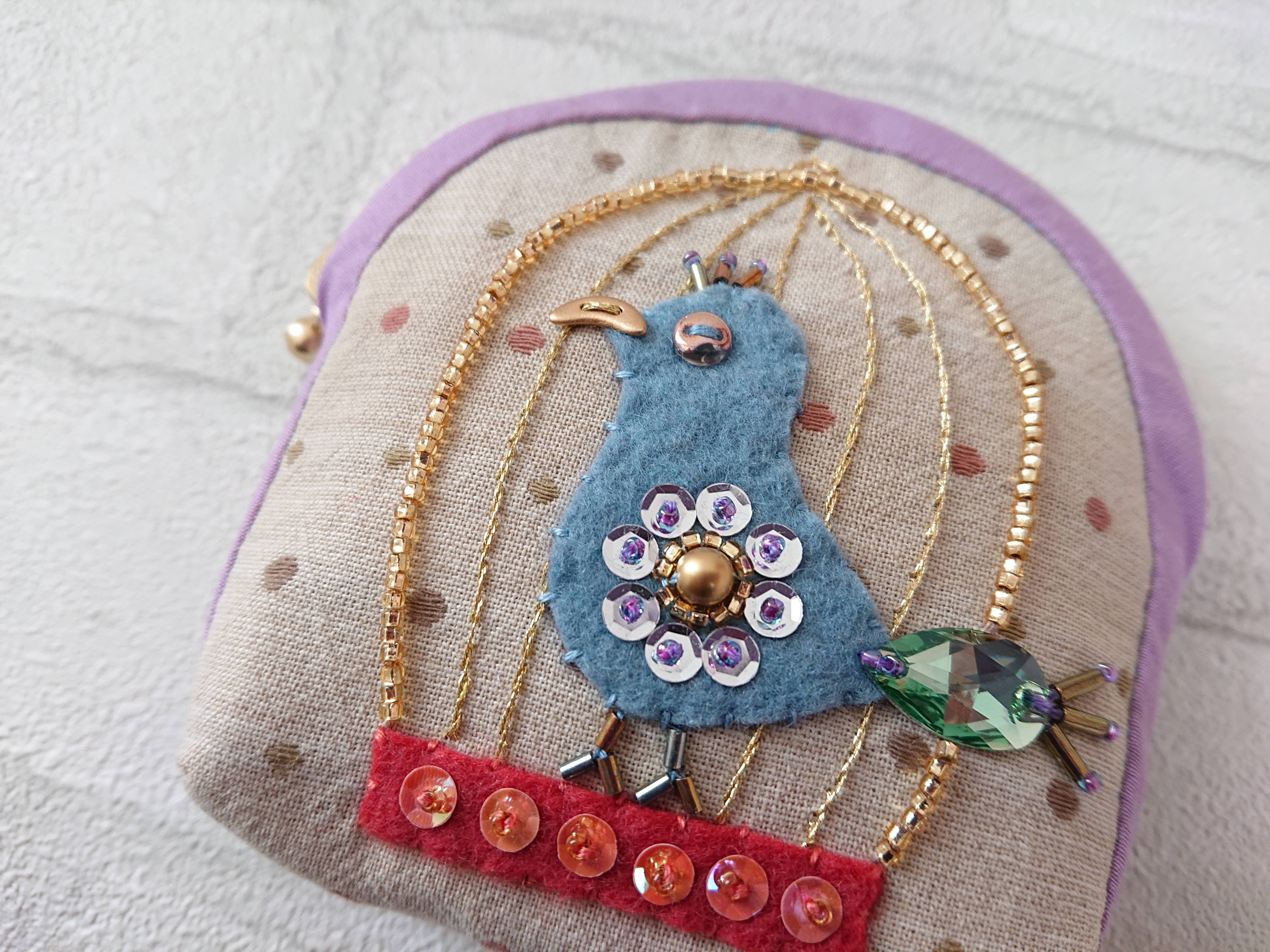 鳥かごのポーチ